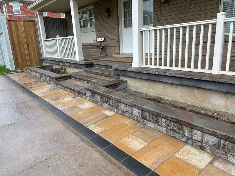 Stone retaining wall with steps